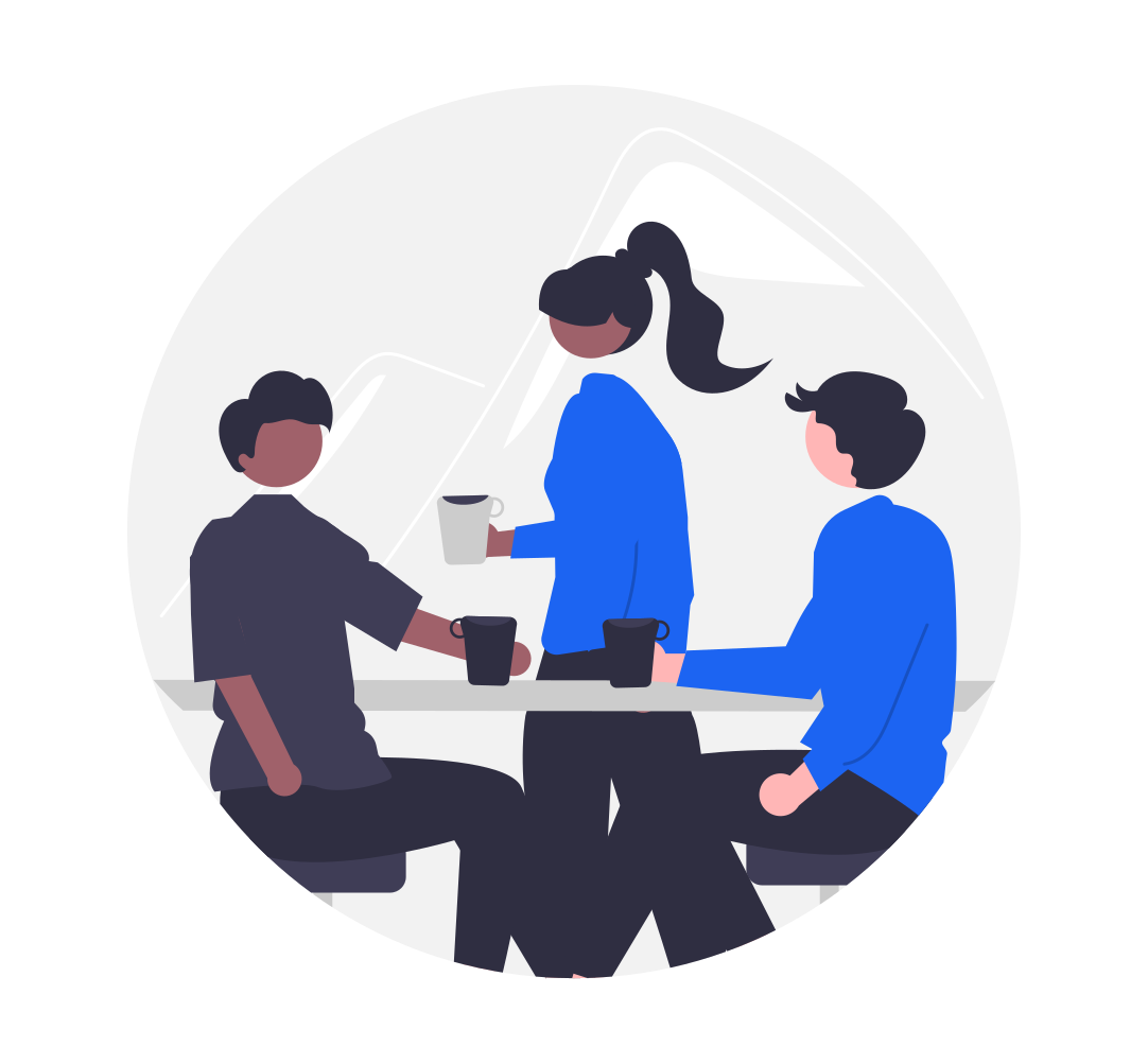 Drie personen die rond een tafel zitten